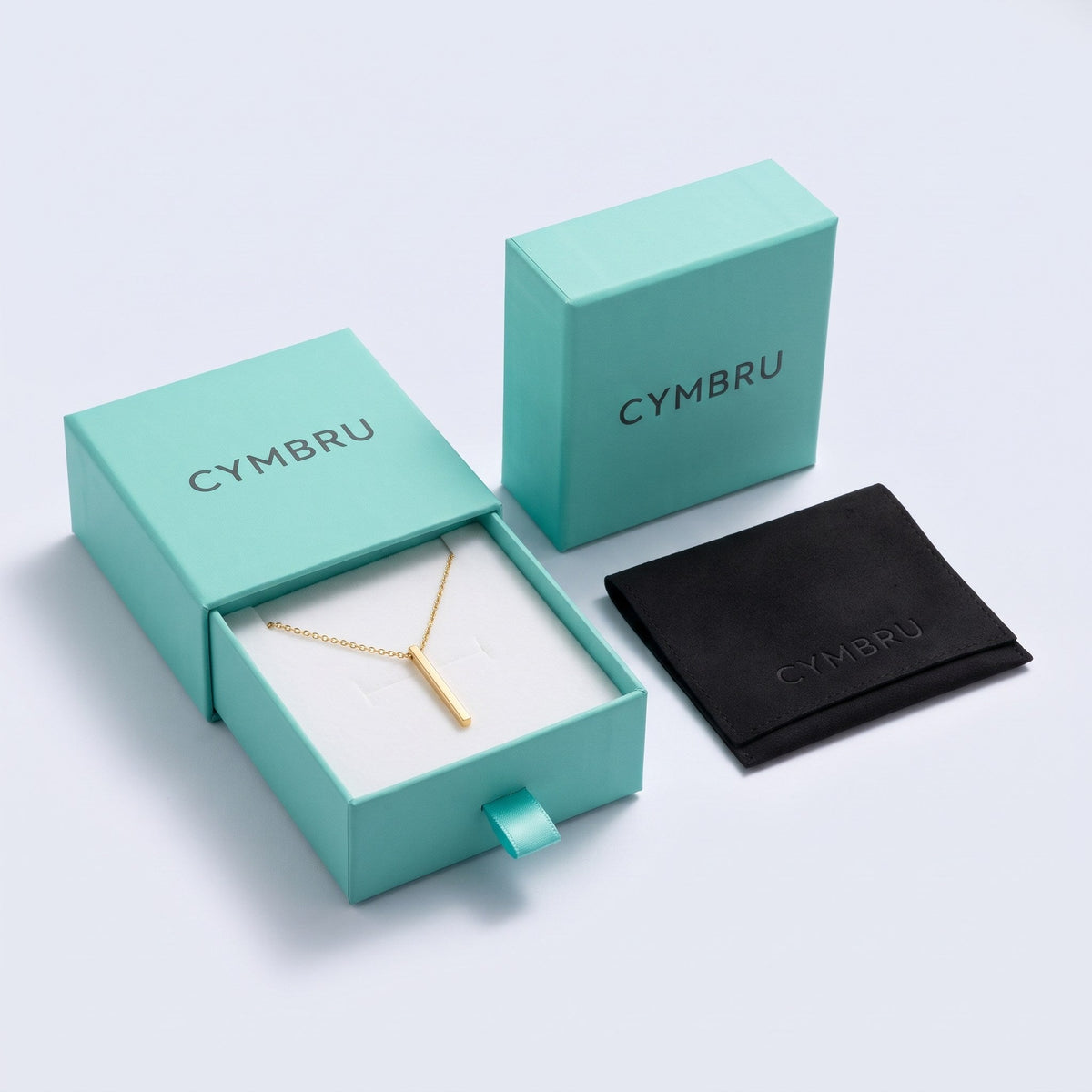CYMBRU teal gift box with white insert and black embossed pouch